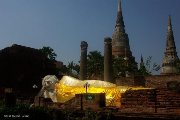 The reclining Buddha with the big chedi in the background