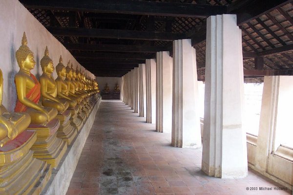 The Buddha images lining the cloister