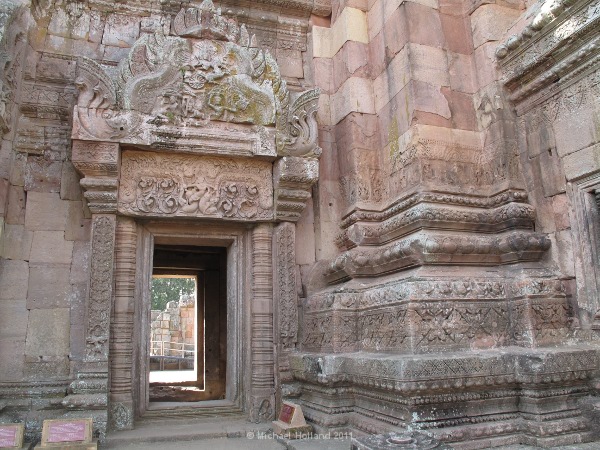 The intricately carved doors and columns of the central sanctuary