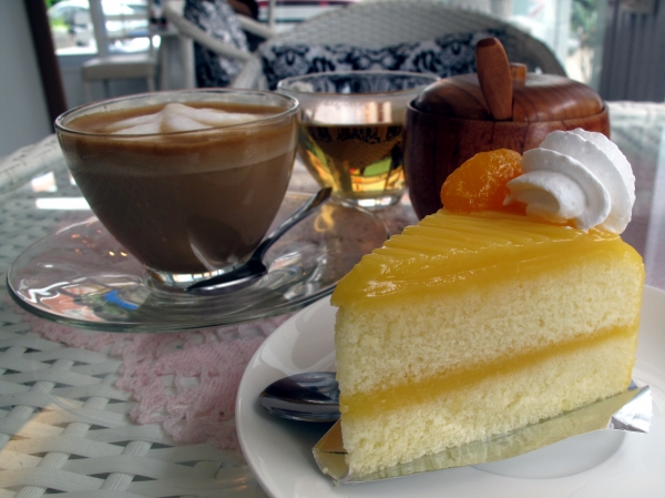 A hot latte and orange cake from I'm Coffee