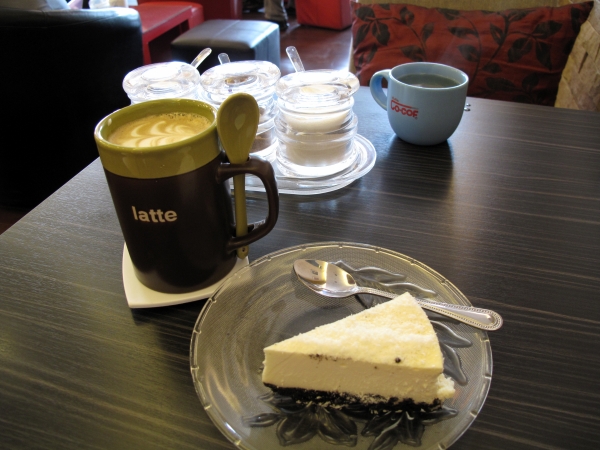 Hot Latte and a white chocolate cheesecake at Coffee Today