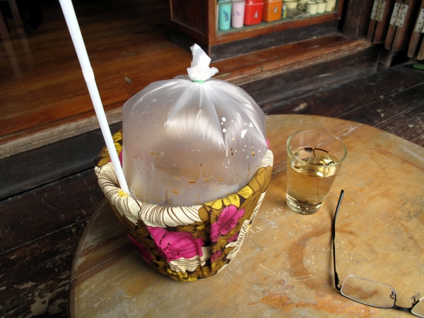 A 'bucket' of coffee at the Kampaengphet Ancient Coffee stall