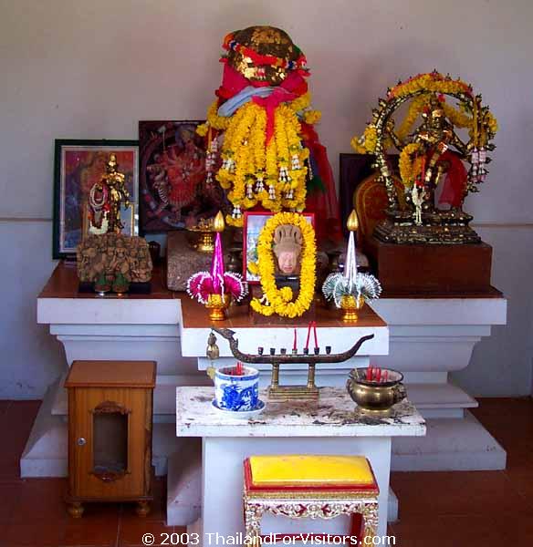 The altar of the shrine, with its statue of Shiva