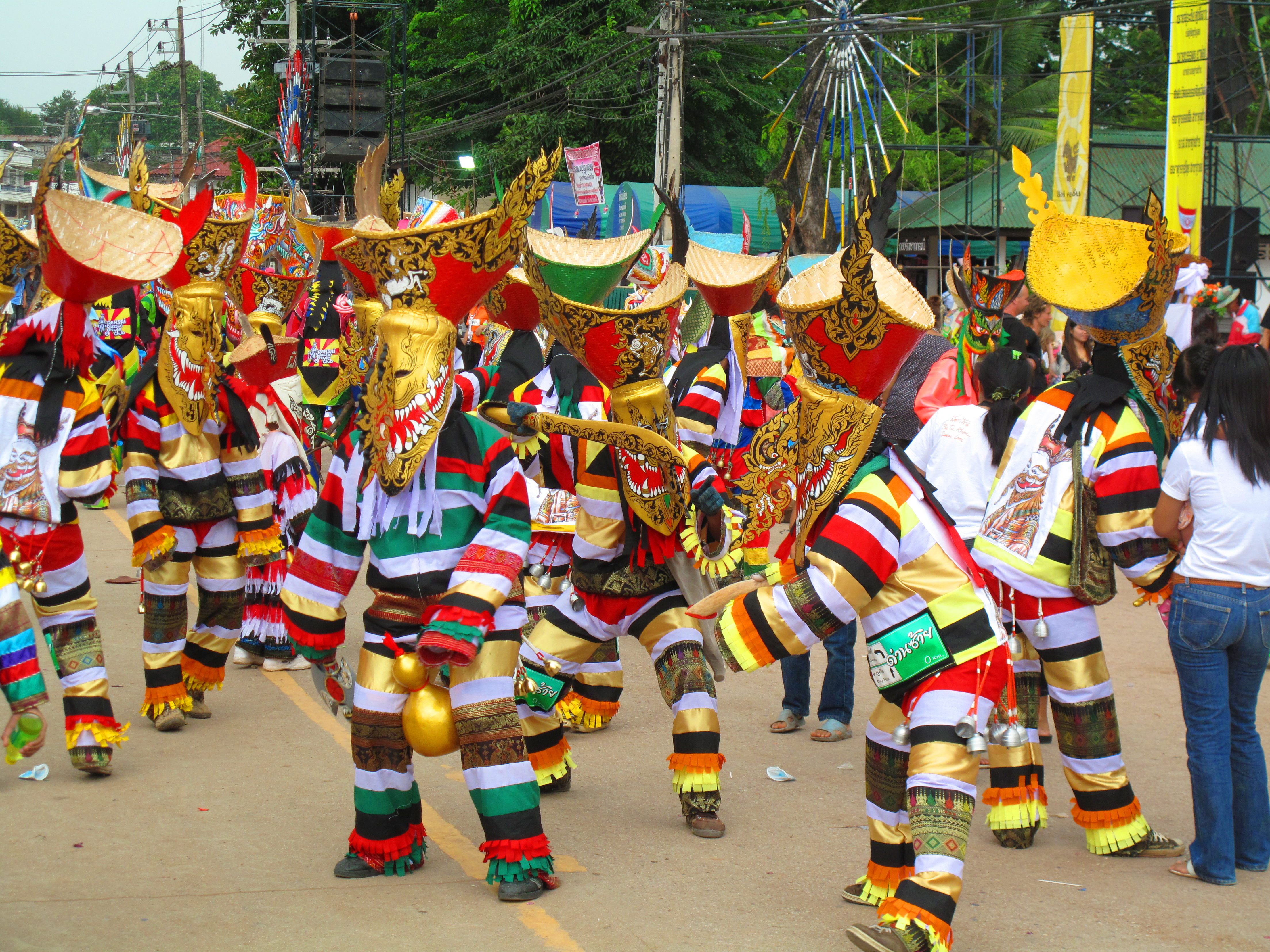 Masked men dancing after the procession