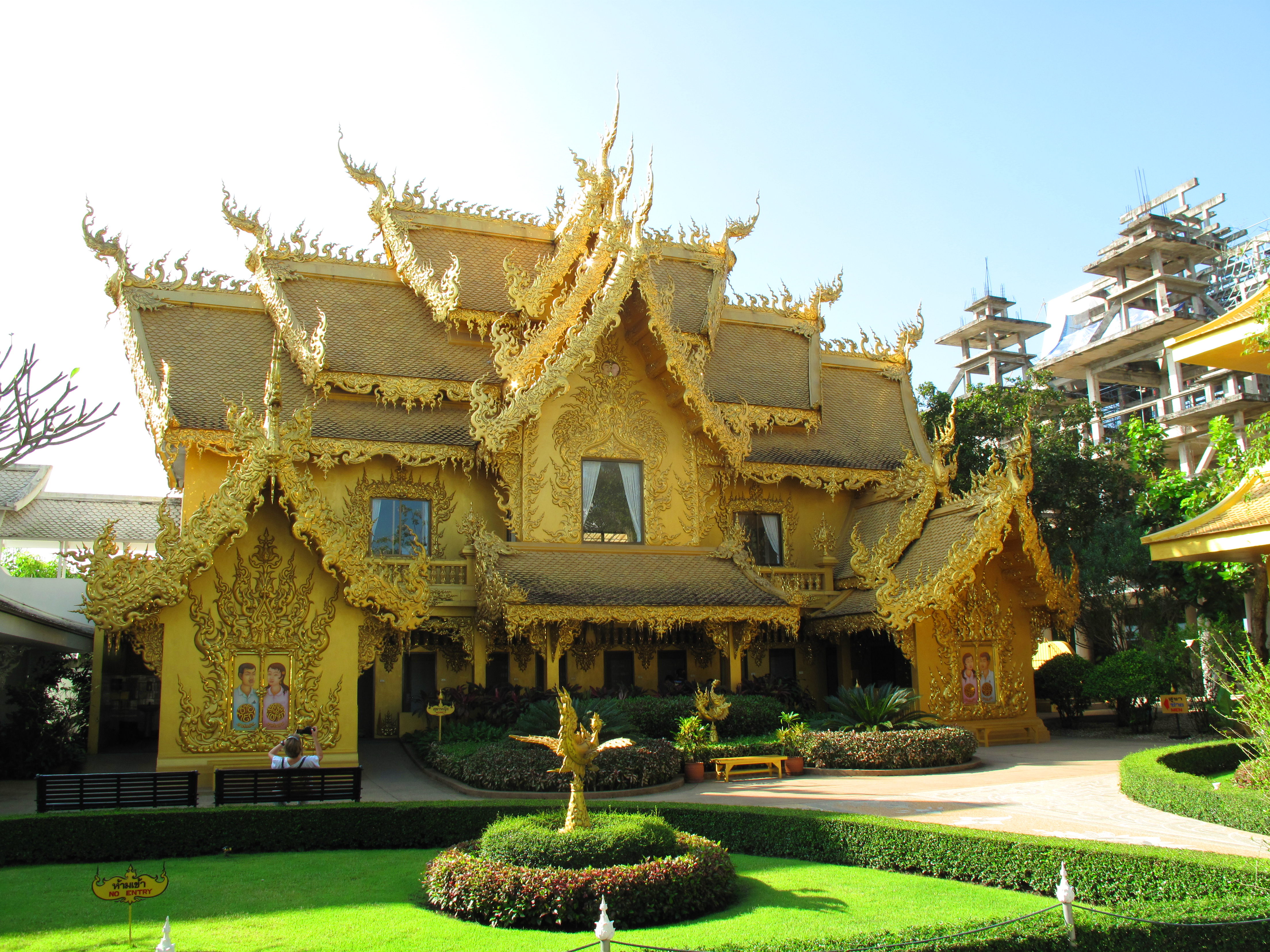 The one gold building of the complex - the toilet