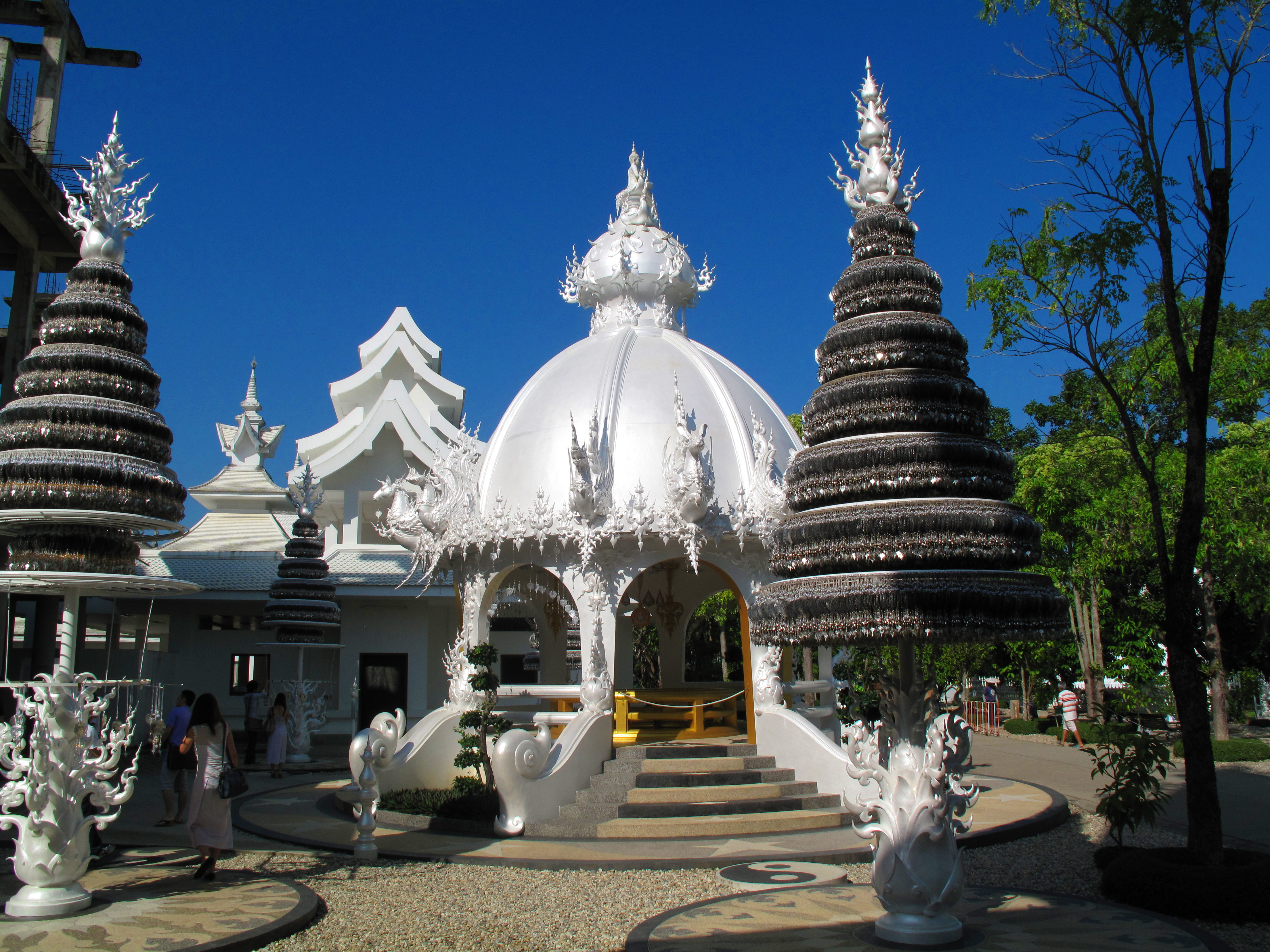 The well, surrounded by towers holding thousands, if not millions, of prayer chimes