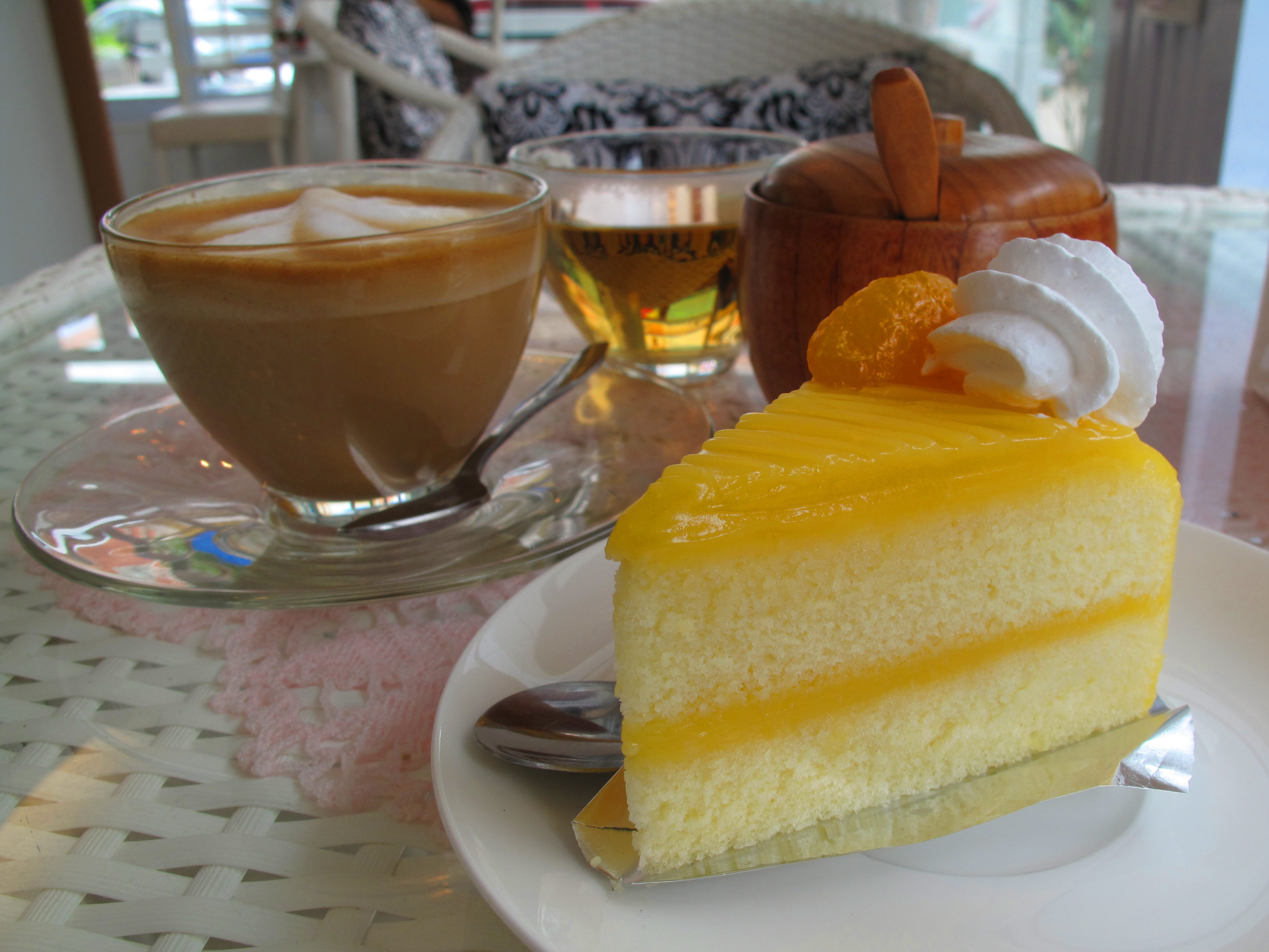 A hot latte and orange cake from I'm Coffee