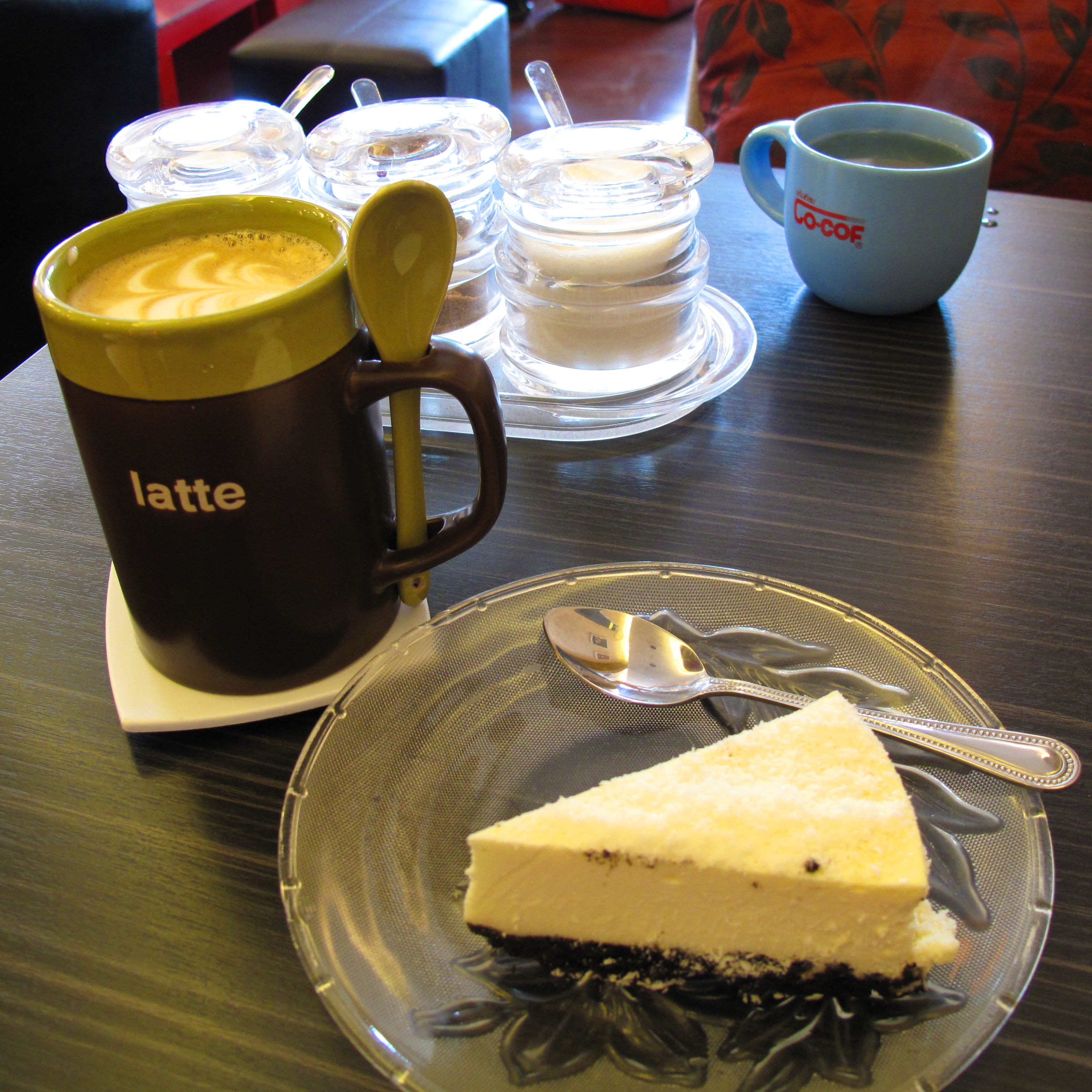 Hot Latte and a white chocolate cheesecake at Coffee Today