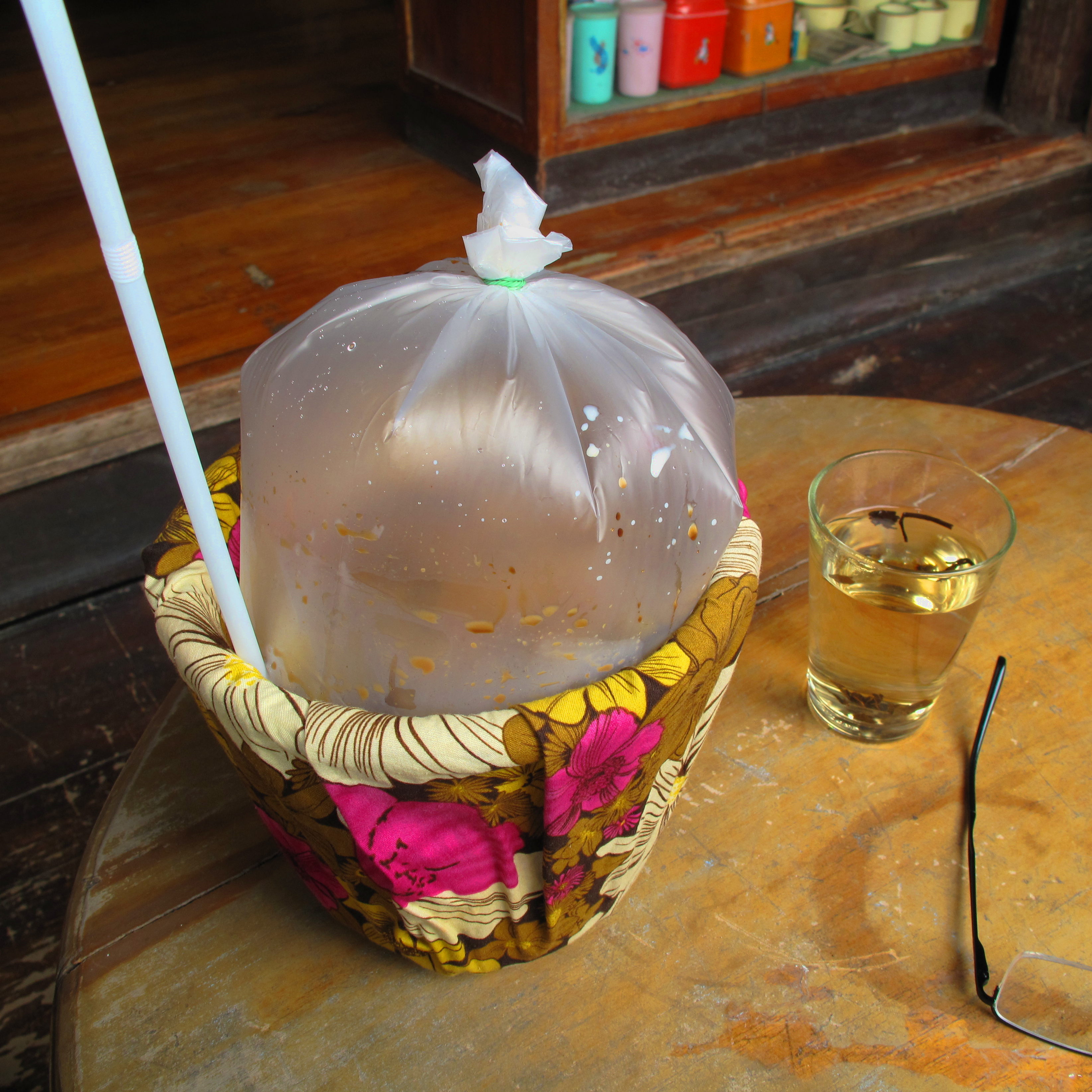 A 'bucket' of coffee at the Kampaengphet Ancient Coffee stall