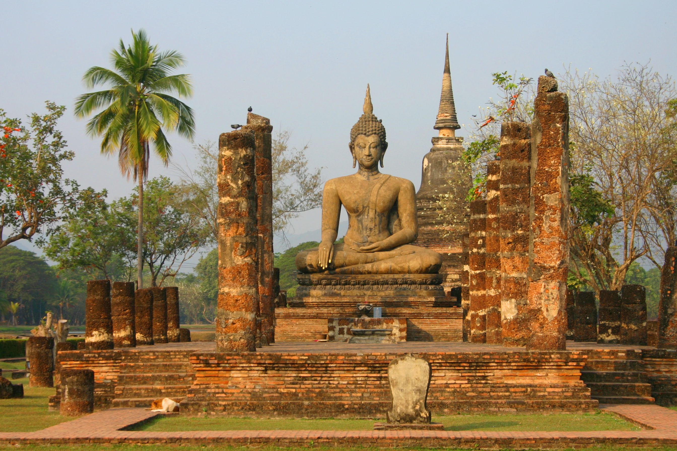 The sublime Buddha image in the ruins of the ordination hall