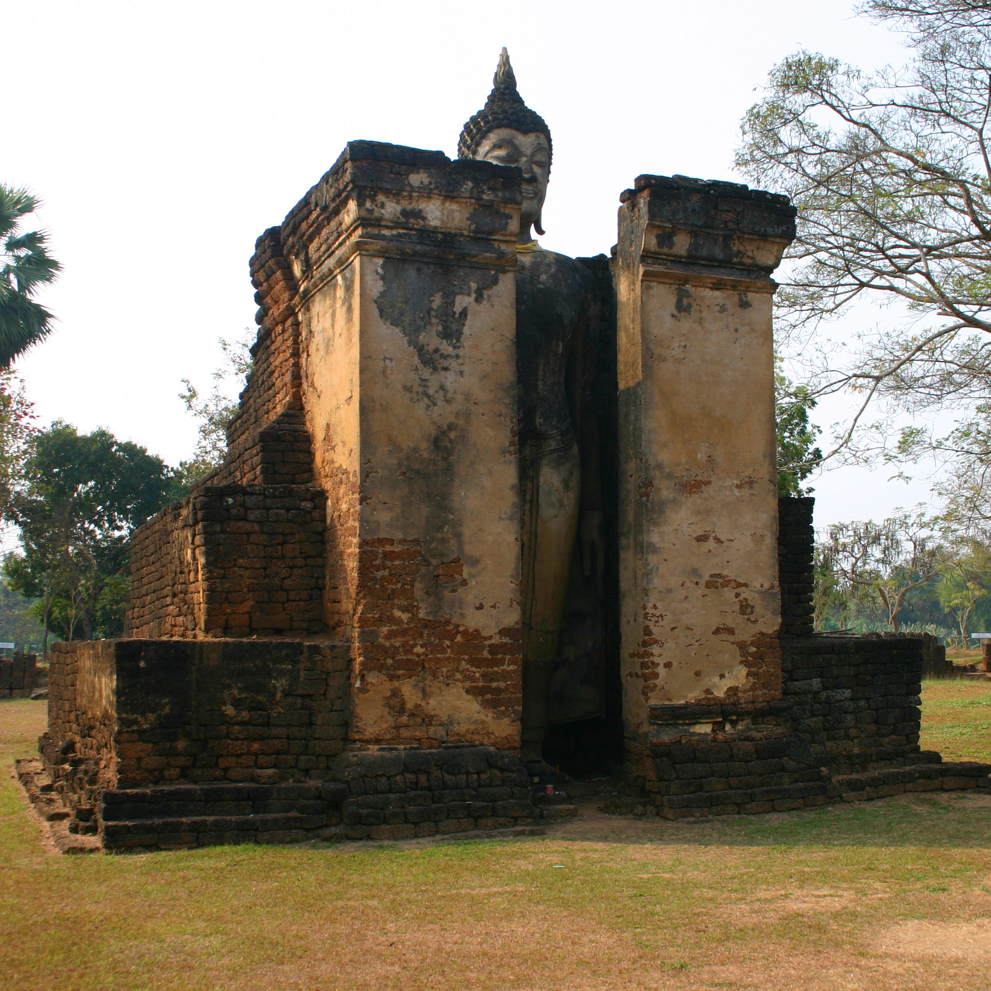 A standing Buddha tightly held in Wat Phra Si Ratana Mahathat